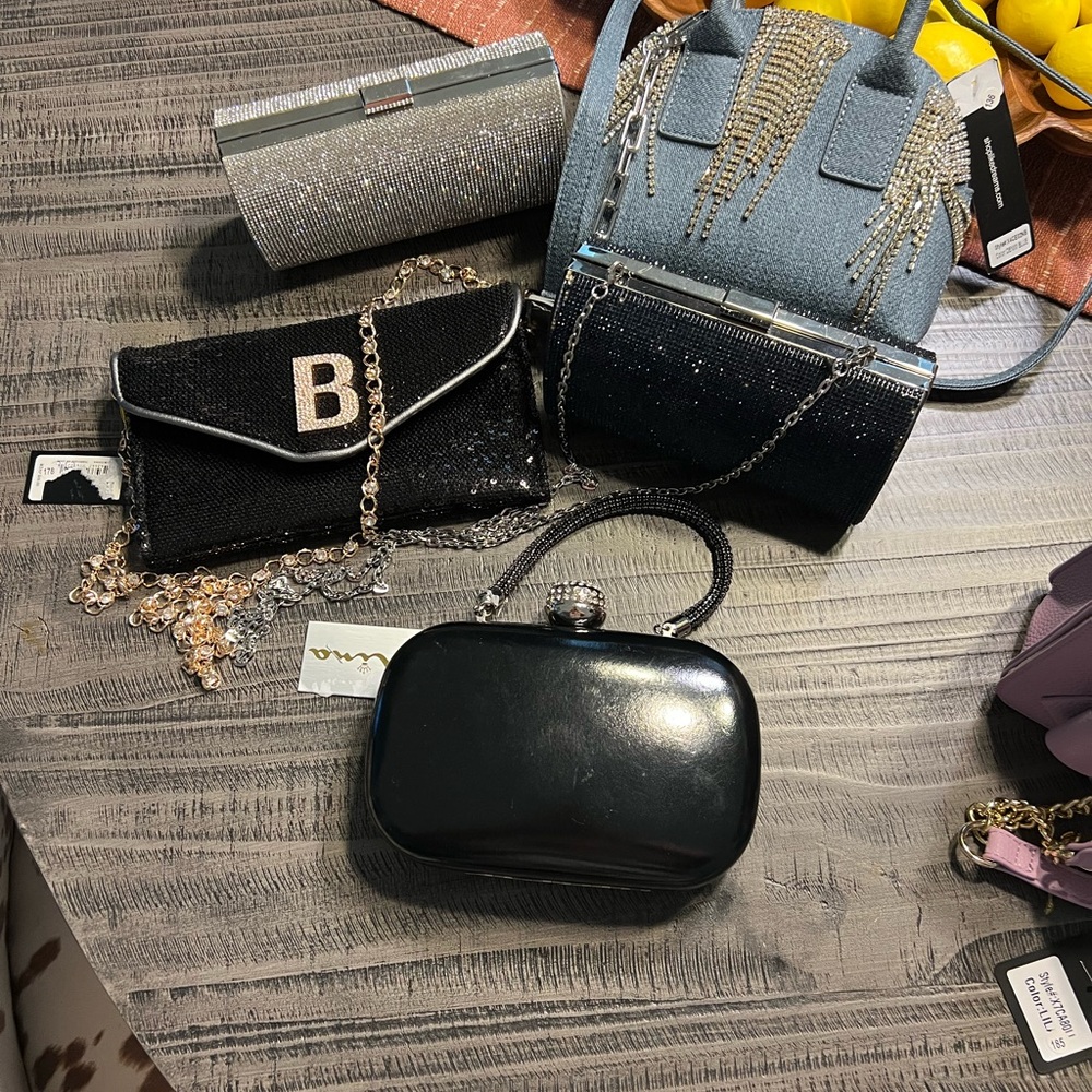 Bebe Black Clutch with Glossy Finish